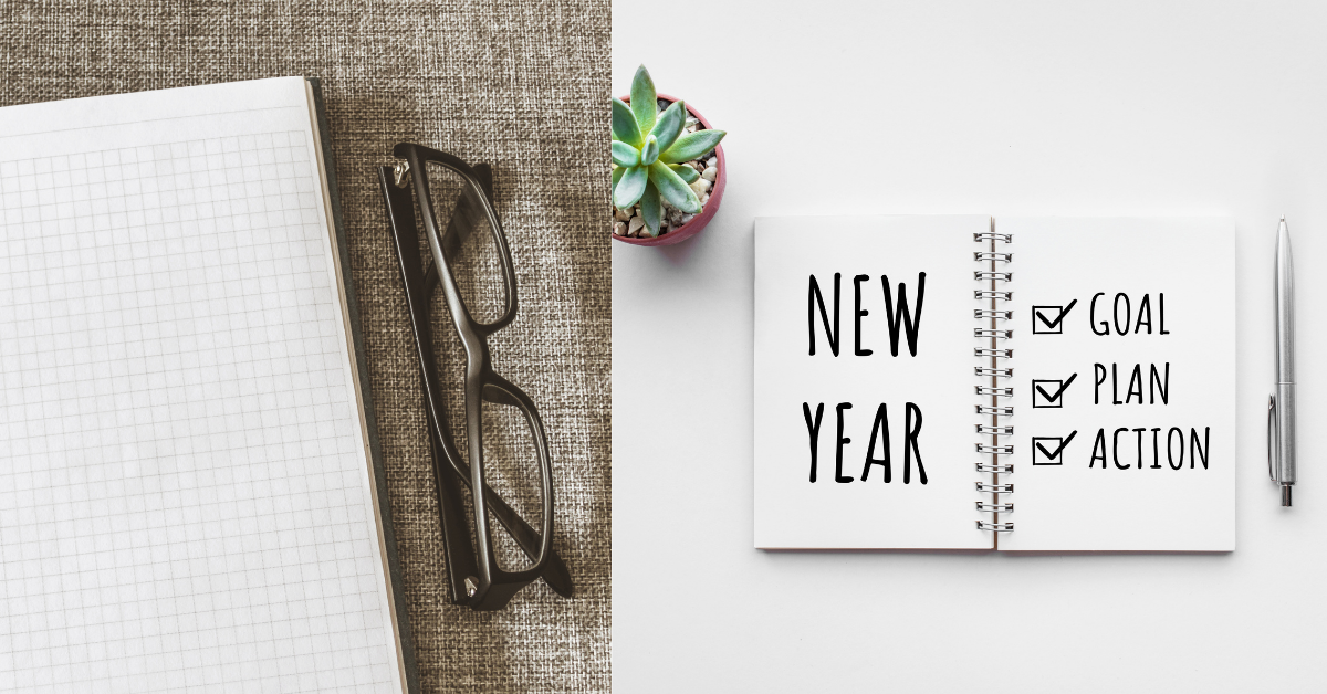 new year goals journal and glasses